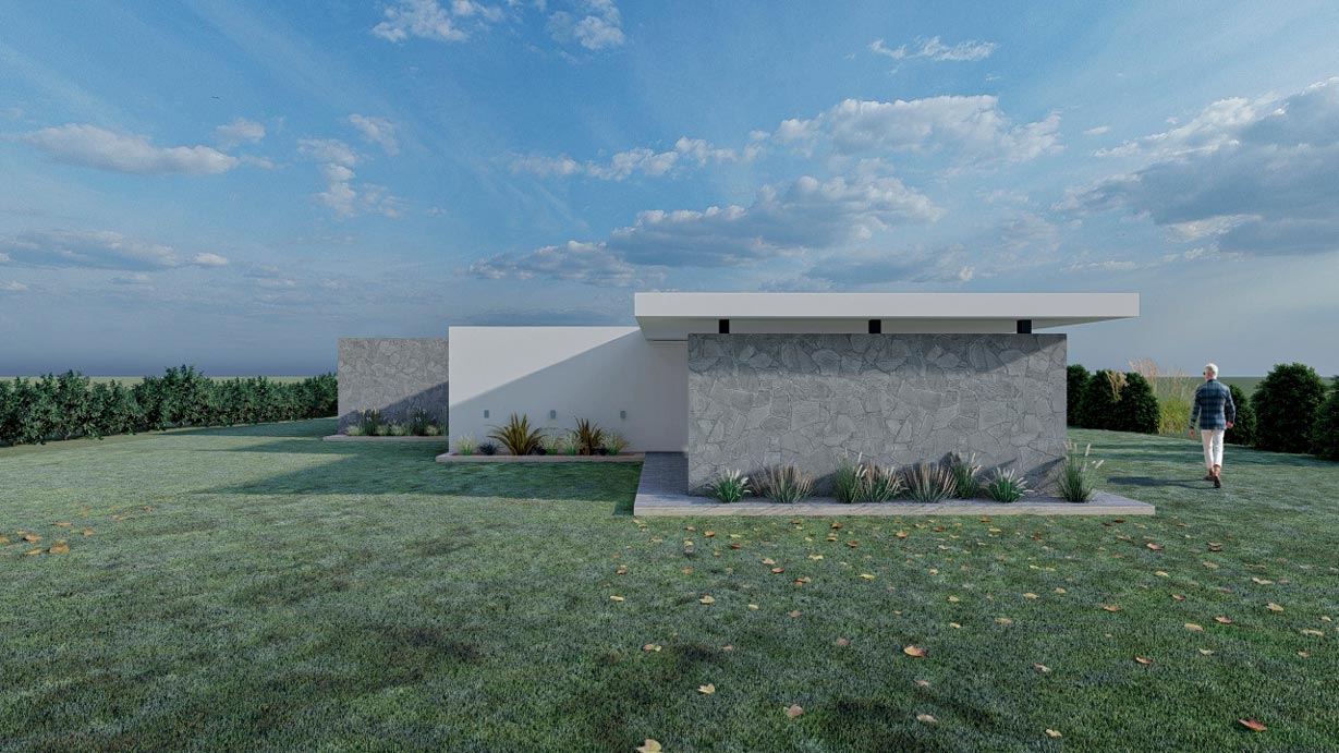 frente de vivienda introvertida revestimiento de piedra con vegetación y arboles